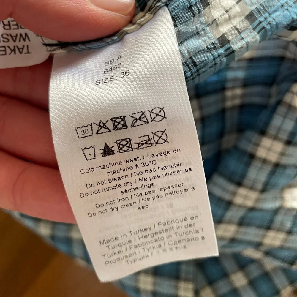 GANNI Seersucker Check V-Neck Ruffle Blouse in Azure Blue - Picture 13 of 14